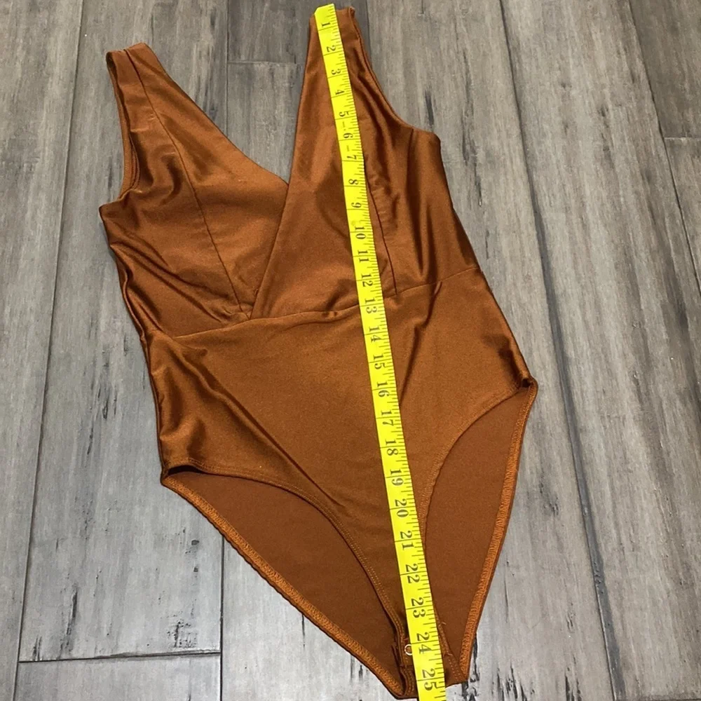 AKIRA bodysuit rust